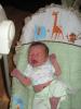 Colin crying in baby swing