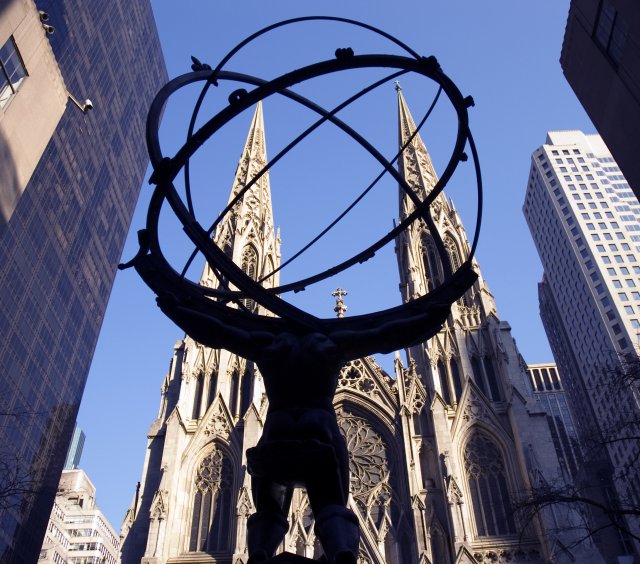 Man With The Weight Of The World Before The House of God