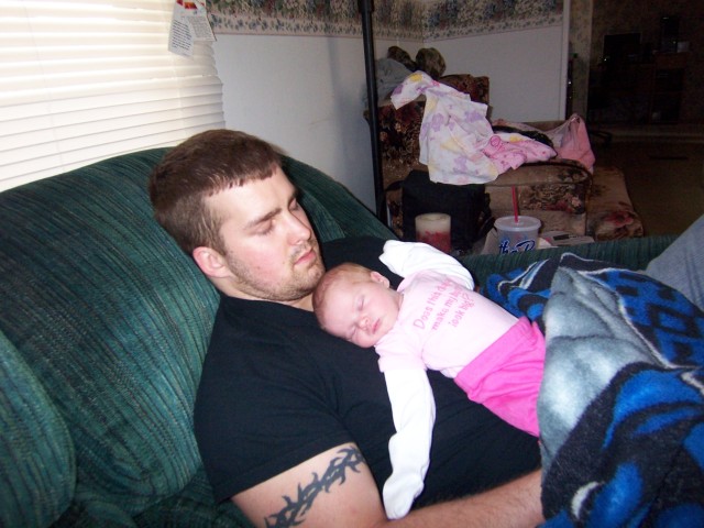 Sleeping on her daddy's chest 1wk old